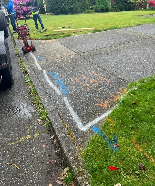 Broom finish driveway and decorate borders in Federal Way 